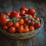 Vibrant basket of fresh red tomatoes on a rustic wooden table, perfect for healthy food concepts.